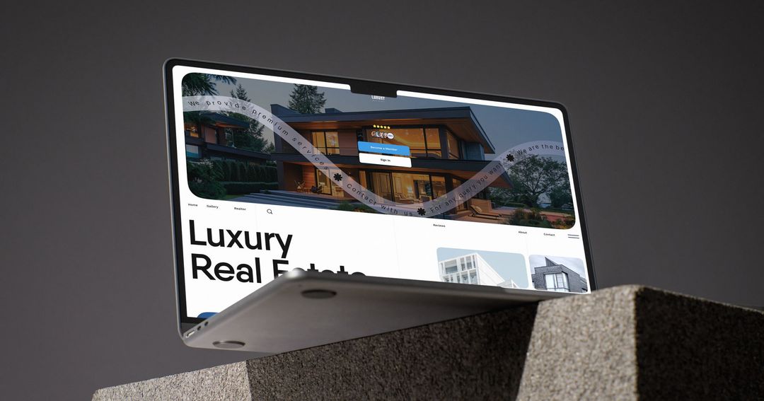 Luxury real estate website design displayed on a laptop